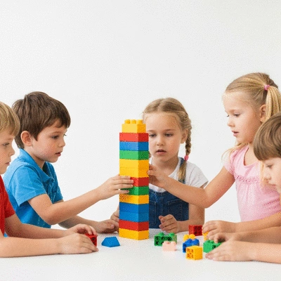 Children playing together with building blocks, representing cooperation and problem-solving, no text, no words, no typography, 8K